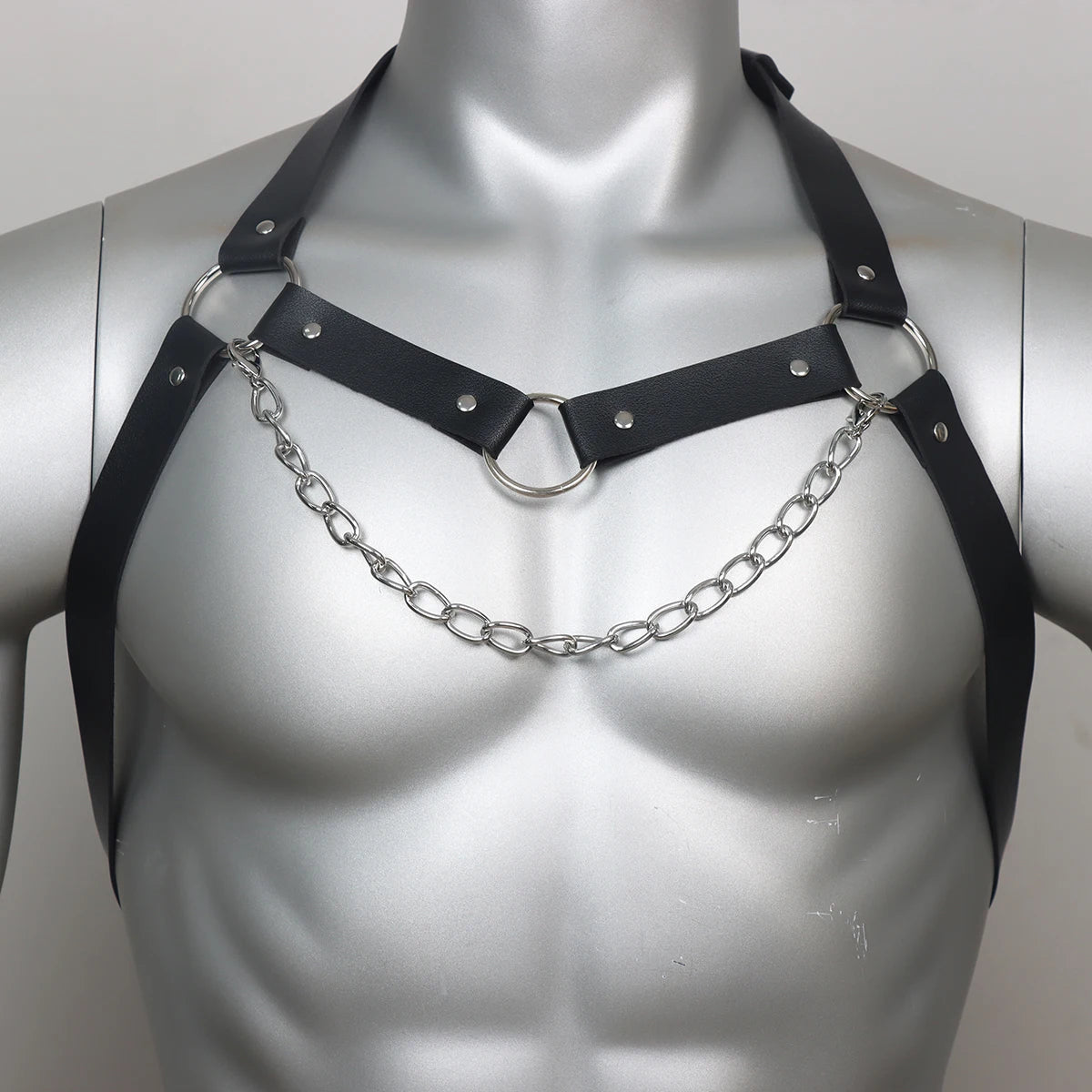 Front close-up of the harness with a center ring and draped chain on a mannequin